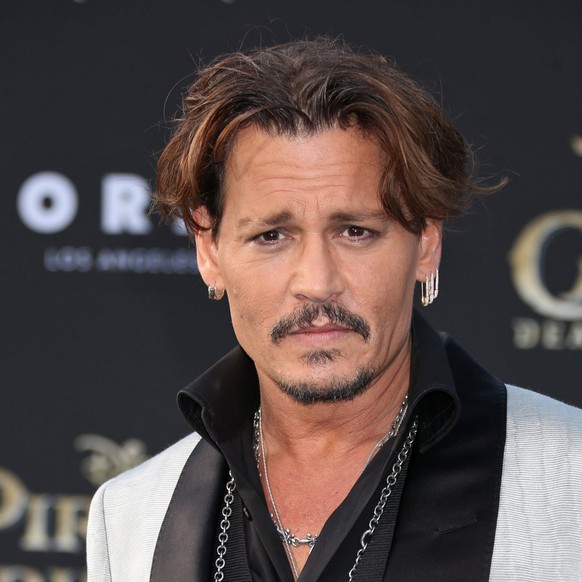 epa05973422 US actor Johnny Depp arrives at the premiere of Disney&#039;s and Jerry Bruckheimer Films Pirates of the Caribbean: Dead Men Tell No Tales at the Dolby Theatre, Hollywood, California, USA, ...