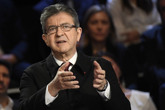 epa05888879 French presidential election candidate for the far-left coalition La France insoumise Jean-Luc Melenchon gestures as he speaks during a debate organised by the French private TV channels B ...