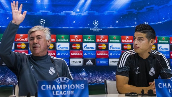epa06080995 (FILE) - Real Madrid&#039;s head coach Carlo Ancelotti (L) and his player James Rodriguez (R) during a press conference held after a team&#039;s training session at Valdebebas Sports Compl ...