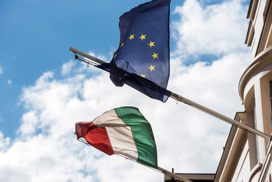 epa05566824 The flag of Hungary and of the European Union fly next to each other on the Embassy of Hungary in London, Britain, 02 October 2016. Hungary holds a referendum on the European Union&#039;s  ...