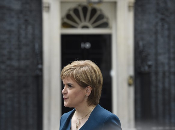 epa05600961 Scottish First Minister Nicola Sturgeon after attending a meeting of the Joint Ministerial Committee in N10 Downing street in London, Britain, 24 October 2016. Discussions focus on issues  ...