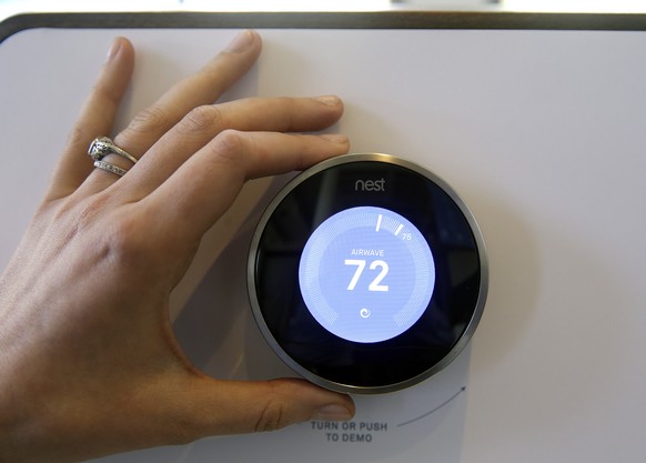 The Nest Learning Thermostat is on display following a news conference Wednesday, June 17, 2015, in San Francisco. Google&#039;s Nest Labs is releasing new versions of its surveillance video camera an ...