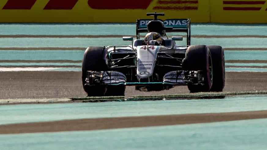 epa05648416 British Formula One driver Lewis Hamilton of Mercedes AMG GP in action during the third practice session at Yas Marina Circuit in Abu Dhabi, United Arab Emirates, 26 November 2016. The For ...