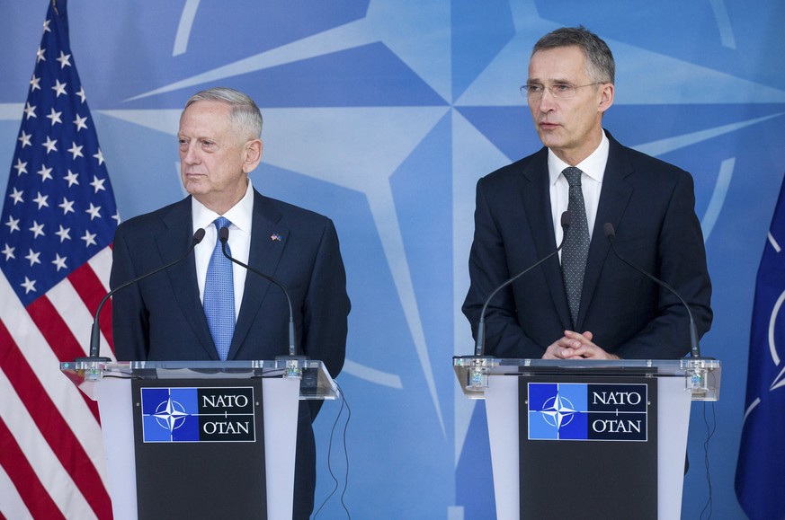epa05794639 US Defence Secretary James Mattis (L) and NATO Secretary General Jens Stoltenberg (R) give a press conference during the NATO Defense Ministers Council at the alliance&#039;s headquarters  ...