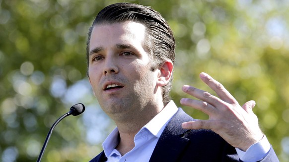 FILE - In this Friday, Nov. 4, 2016 file photo, Donald Trump Jr. campaigns for his father Republican presidential candidate Donald Trump in Gilbert, Ariz. Donald Trump’s eldest son, son-in-law and the ...