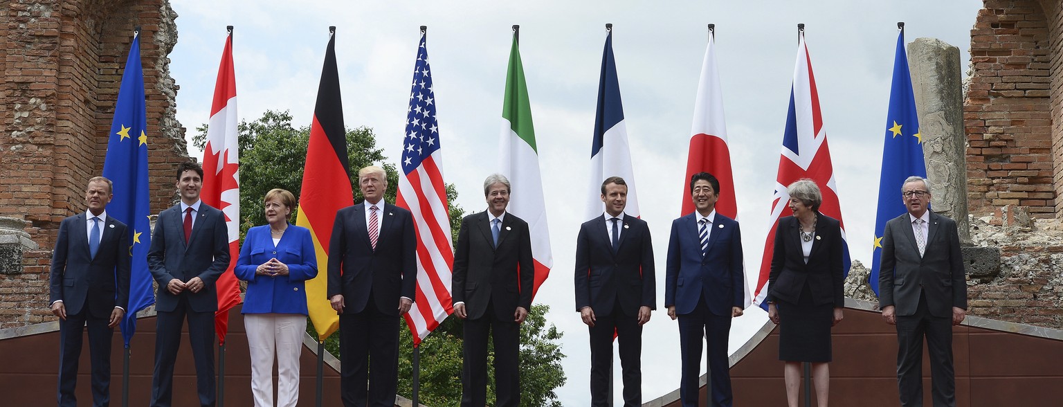 G7 leaders, from left, European Council President Donald Tusk, Canadian Prime Minister Justin Trudeau, German Chancellor Angela Merkel, U.S. President Donald Trump, Italian Prime Minister Paolo Gentil ...