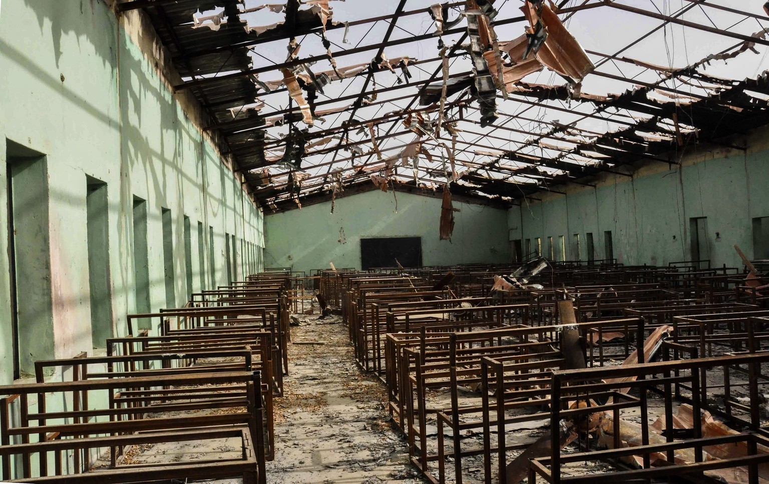 epa04653427 A photograph made available 08 March 2015 shows the burnt examination hall of the Government Secondary School in Chibok where 215 students were abducted by Boko Haram Islamic militants abo ...