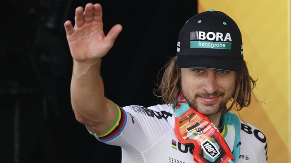 epa06063833 Bora Hansgrohe team rider Peter Sagan of Slovakia celebrates on the podium after winning the 3rd stage of the 104th edition of the Tour de France cycling race over 212,5km between Verviers ...
