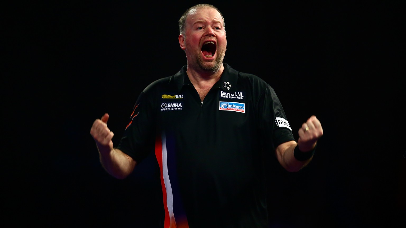 LONDON, ENGLAND - DECEMBER 29: Raymond van Barneveld of Holland celebrates victory in his third round match against Michael van Gerwen of Holland on Day Eleven of the 2016 William Hill PDC World Darts ...