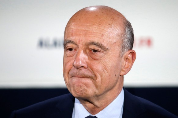 FILE PHOTO: Alain Juppe, current mayor of Bordeaux and member of the conservative Les Republicains political party, delivers his speech to recognise his defeat in the second round for the French cente ...