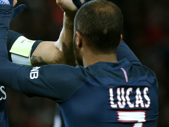 epa05306588 Lucas (R) of Paris Saint Germain reacts after with &lt;Zlatan Ibrahimovic (L) after scoring the 2-0 lead during the French Ligue 1 soccer match between Paris Saint-Germain (PSG) and FC Nan ...