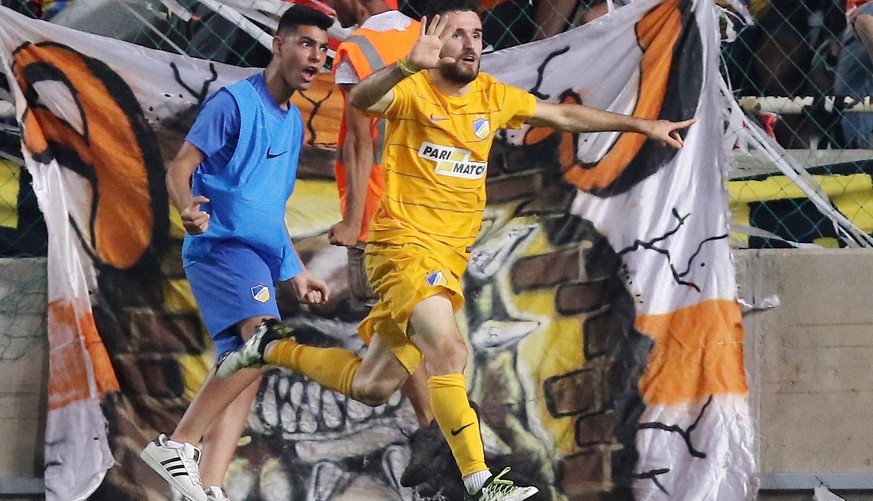 epa05452286 APOEL FC Giannis Gianniotas celebrates a goal during the UEFA Champions League third qualifying round, second leg soccer match between APOEL FC and Rosenborg Trondheim at GSP Stadium in Ni ...