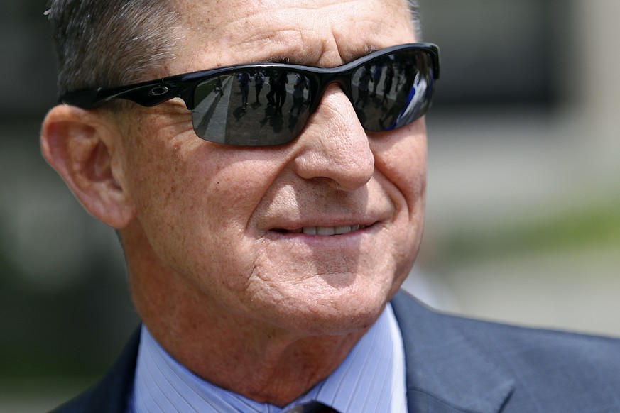 FILE - Michael Flynn, President Donald Trump&#039;s former national security adviser, departs a federal courthouse after a hearing, Monday, June 24, 2019, in Washington. President Donald Trump has par ...