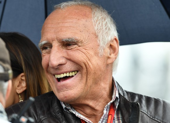 Red Bull founder Dietrich Mateschitz attends the start of the Formula One Grand Prix, at the Red Bull Ring racetrack, in Spielberg, Austria, Sunday, July 3, 2016. (AP Photo/Kerstin Joensson))