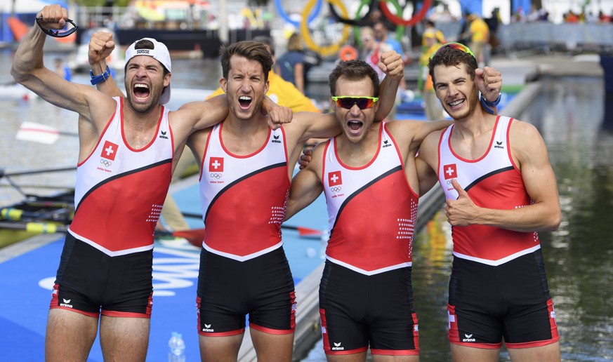 From left, Mario Gyr, Simon Schuerch, Simon Niepmann, and Lucas Tramer of Switzerland react after winning the gold medal of the men&#039;s Lightweight Four final at the Lagoa Stadium in Rio de Janeiro ...