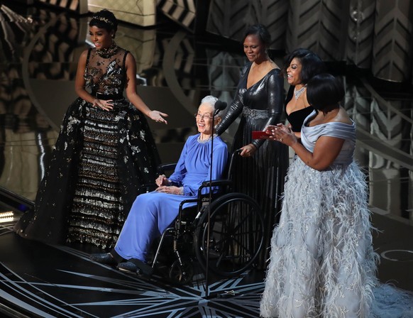 89th Academy Awards - Oscars Awards Show - Hollywood, California, U.S. - 26/02/17 - Taraji P. Henson , Octavia Spencer (R), Janelle Monae (L) and Katherine Johnson (in wheelchair) present for Best Doc ...