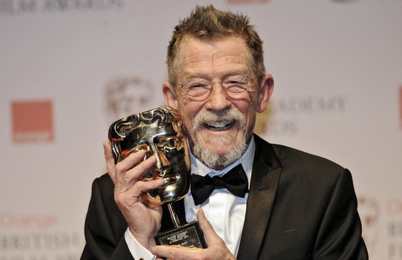 epa05755726 (FILE) - A file picture dated 12 February 2012 shows British actor John Hurt posing with his Outstanding British Contribution award during the BAFTAs, Orange British Academy Film Awards, i ...