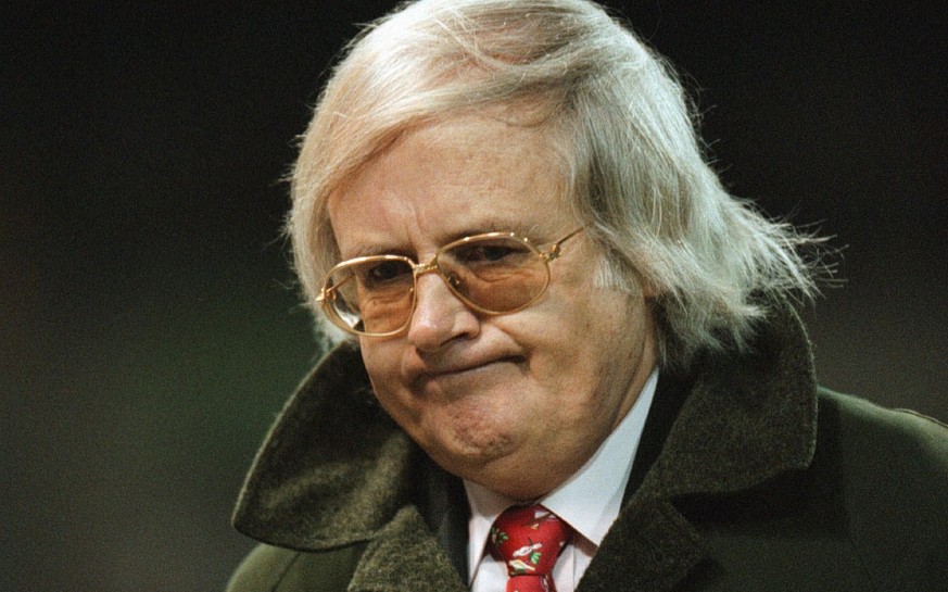 The new coach of Switzerland, Gilbert Gress, pulls a face during a friendly soccer game between Switzerland and England in Bern on Wednesday, March 25, 1998. (KEYSTONE / Alessandro della Valle)