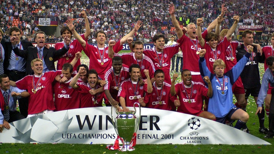 Bayern Munich team celebrate after clinching the Champions League trophy at the San Siro stadium in Milan, Italy, Wednesday, May 23, 2001. Bayern defeated Valencia. (AP Photo/Luca Bruno)