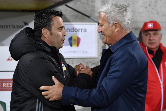 Swiss head coach Vladimir Petkovic, right, welcomes Andorra’s head coach Koldo Alvarez during the 2018 Fifa World Cup Russia group B qualification soccer match between Switzerland and Andorra at the k ...