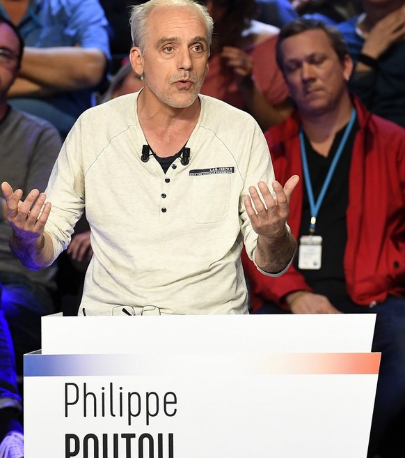 epa05888475 French presidential election candidate for the far-left New Anticapitalist Party (NPA) Philippe Poutou speaks during a debate organized by French private TV channels BFM TV and CNews, betw ...