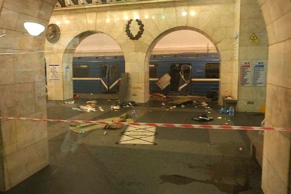 epa05886221 A handout photo made available by megapolisonline.ru via VKontakte (VK) shows a damaged train station shortly after an explosion in a metro of Saint Petersburg, Russia, 03 April 2017. Acco ...