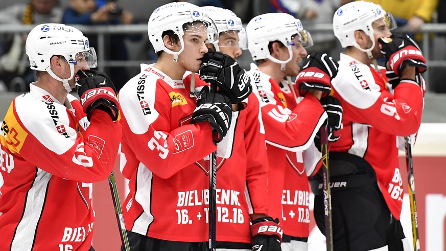 Switzerland&#039;s player react after the game between Switzerland and Germany during the Ice Hockey Deutschland Cup at the Curt-Frenzel-Eisstadion in Augsburg, Germany, Saturday, November 5, 2016. (K ...