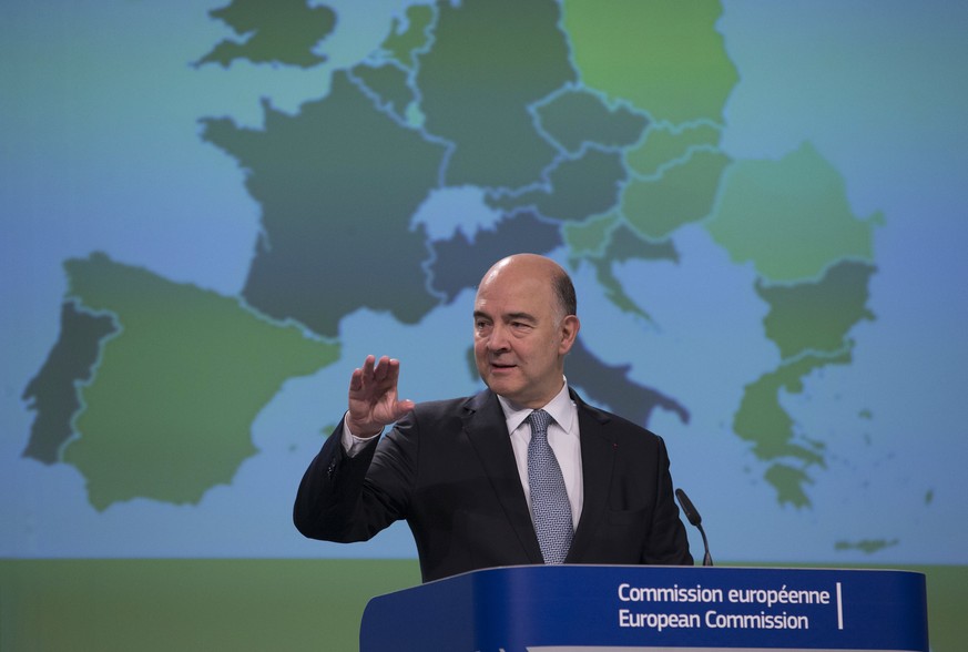 epa05956396 European Commissioner for Economic and Financial Affairs, Taxation and Customs, Pierre Moscovici, gestures while speaking at a news conference in Brussels, Belgium, 11 May 2017. Moscovici  ...