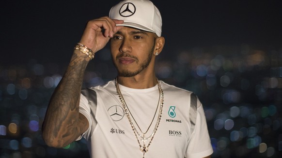 IMAGE DISTRIBUTED FOR ST REGIS ABU DHABI/STARWOOD - Mercedes AMG Petronas Formula 1 driver Lewis Hamilton stands on the highest Helipad in the Middle East (255m) at the St Regis Hotel, in Abu Dhabi, U ...