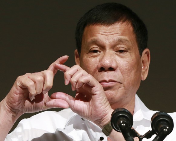 FILE - In this Oct. 26, 2016, file photo, Philippine President Rodrigo Duterte delivers a speech at the Philippine Economic Forum in Tokyo. Duterte, who has lashed out at U.S. President Barack Obama f ...