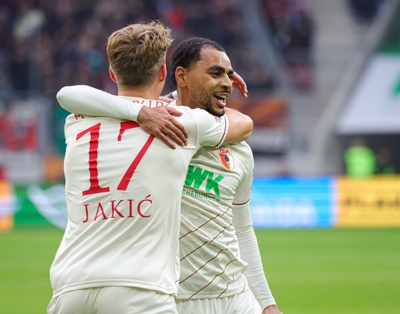 Nachrichten Linkding Alexis Claude-Maurice FC Augsburg 20 jubelt nach seinem Tor zum 1:1 Ausgleich mit Kristijan Jaki� FC Augsburg 17 FC Augsburg vs. Borussia Dortmund, 8. Spieltag DFL REGULATIONS PROHIBIT ANY USE OF PHOT ...