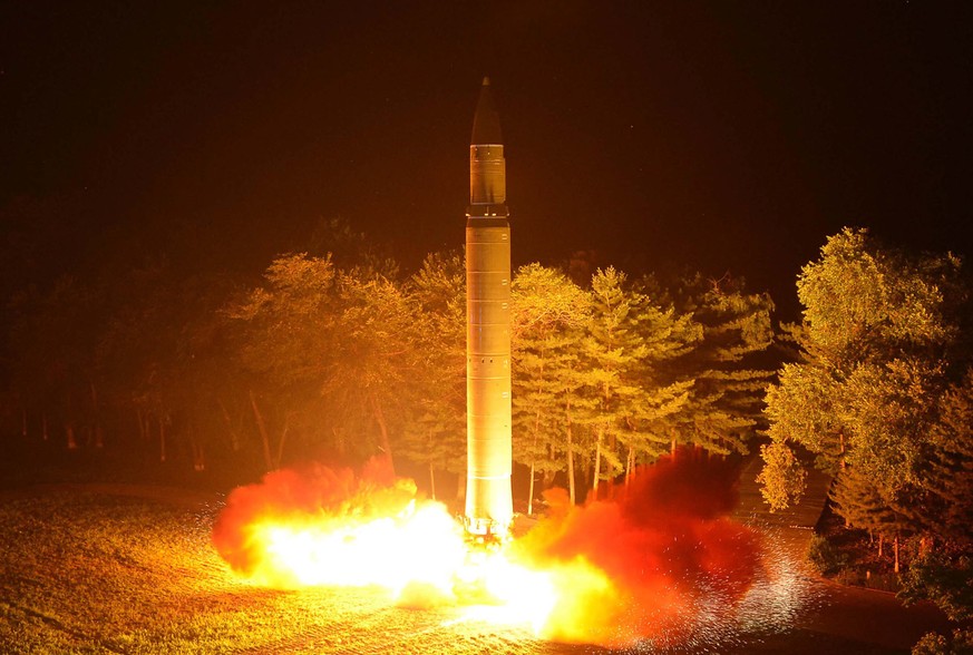 FILE - In this July 28, 2017, file photo distributed by the North Korean government, shows what was said to be the launch of a Hwasong-14 intercontinental ballistic missile at an undisclosed location  ...