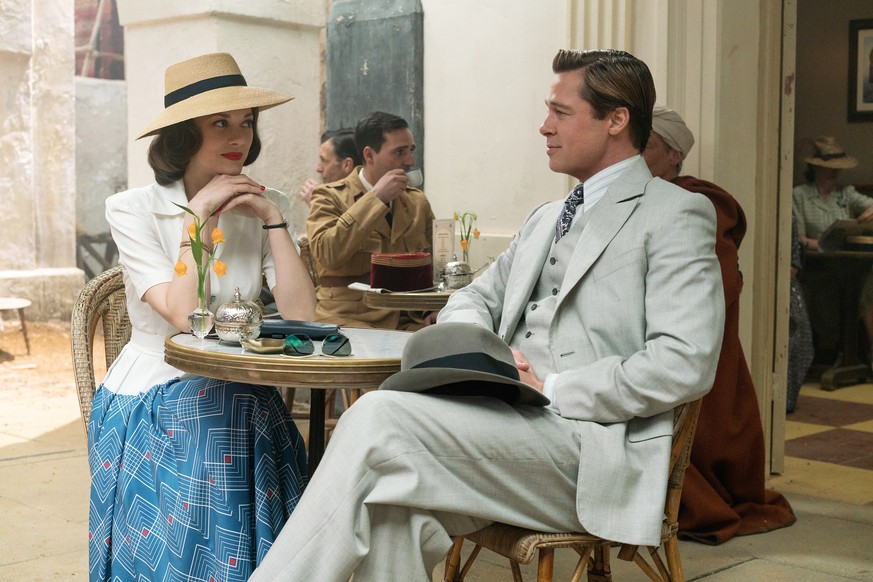 This image released by Paramount Pictures shows Marion Cotillard, left, and Brad Pitt in a scene from, &quot;Allied,&quot; in theaters on November 23. (Daniel Smith/Paramount Pictures via AP)