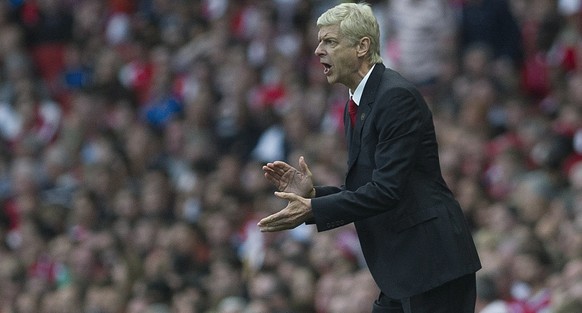 Arsenal&#039;s manager Arsene Wenger gives instructions from the sidelines during their English Premier League soccer match against Crystal Palace, at Emirates Stadium, in London, Saturday, Aug. 16, 2 ...