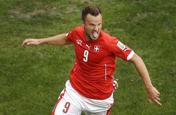 FILE - In this June 15, 2014 file picture Switzerland&#039;s Haris Seferovic celebrates scoring his side&#039;s second goal during the group E World Cup soccer match between Switzerland and Ecuador at ...