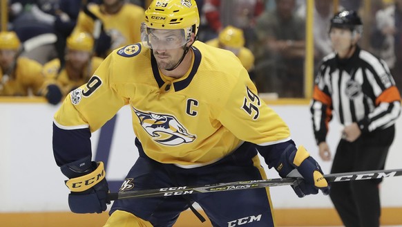 Nashville Predators defenseman Roman Josi, of Switzerland, winds up to shoot against the Florida Panthers during the second period of the second game in an NHL hockey preseason doubleheader Tuesday, S ...