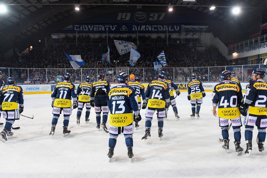 Ambri&#039;s players celebrate their victory, during the preliminary round game of the National League Swiss Championship 2017/18 between HC Ambri Piotta and HC Lausanne, at the ice stadium Valascia i ...