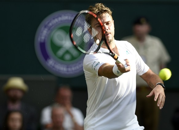 epa06064012 Stan Wawrinka of Switzerland in action against Daniil Medvedev of Russia during their first round match for the Wimbledon Championships at the All England Lawn Tennis Club, in London, Brit ...