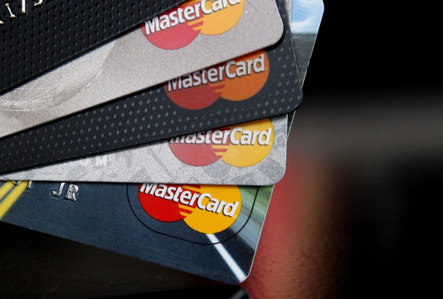FILE - In this Thursday, April 25, 2013, file photo, MasterCard credit cards are displayed for a photographer in Montpelier, Vt. MasterCard Inc. reports financial results Tuesday, May 2, 2017. (AP Pho ...