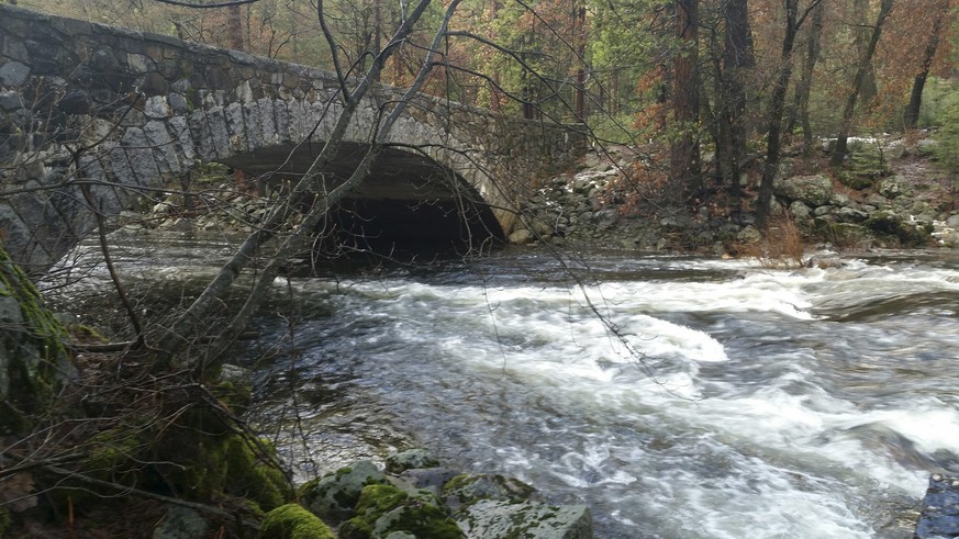 In this photo taken Thursday, Jan. 5, 2017, provided by the National Park Service, the Merced River flows through Yosemite National Park, Calif. Residents of California from the coastline to the Sierr ...