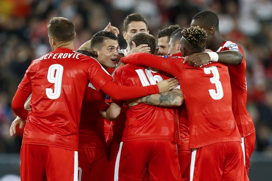 Switzerland&#039;s Steven Zuber, hidden, celebrates with teammates after scoring the 4-0 during the 2018 Fifa World Cup Russia group B qualification soccer match between Switzerland and Hungary in the ...