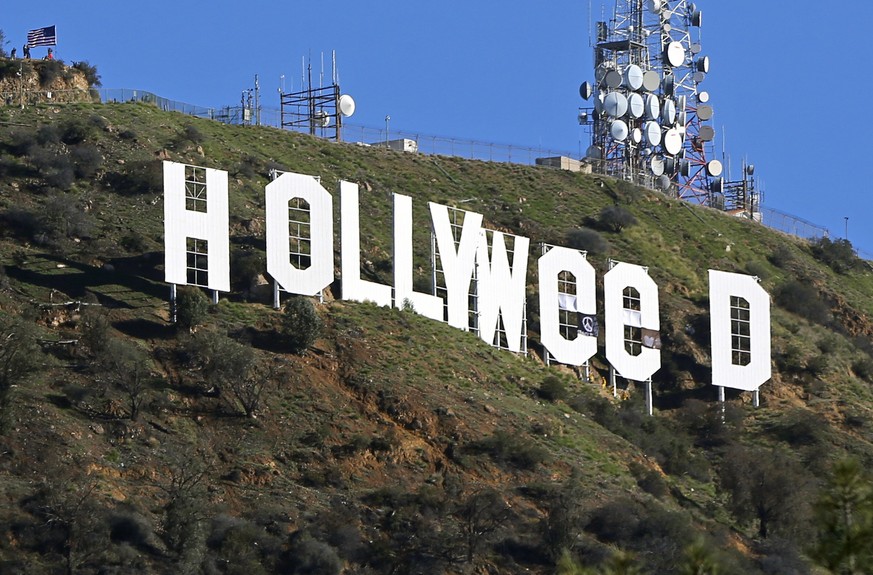 FILE - In this Jan. 1, 2017, file photo, the famed Hollywood sign is seen altered to read &quot;HOLLYWeeD,&quot; in Los Angeles. Los Angeles police said in a statement that 30-year-old Zachary Cole Fe ...