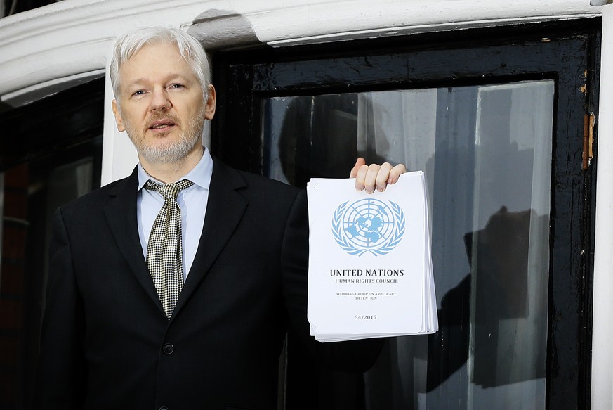 FILE - In this Feb. 5, 2016, file photo WikiLeaks founder Julian Assange speaks on the balcony of the Ecuadorean Embassy in London. President Barack Obama’s decision to commute Chelsea Manning’s sente ...