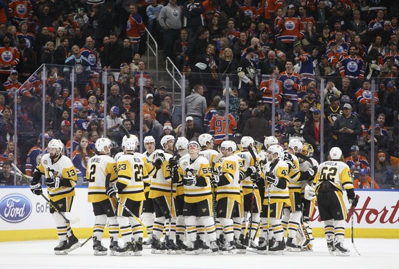 Pittsburgh Penguins celebrate a shootout win over the Edmonton Oilers in an NHL hockey game Friday, March 10, 2017, in Edmonton, Alberta. (Jason Franson/The Canadian Press via AP)