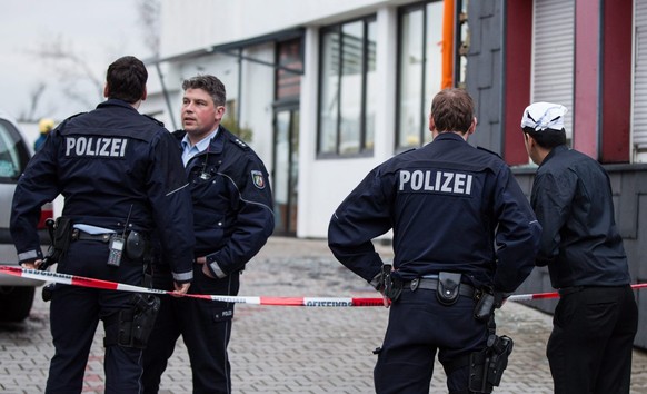 epa05262720 CORRECTION epa05262544 German police at the scene of an explosion at a Sikh temple in Essen, Nordrhein-Westfalen, Germany, 16 April 2016. Reports state the cause of the explosion, in which ...