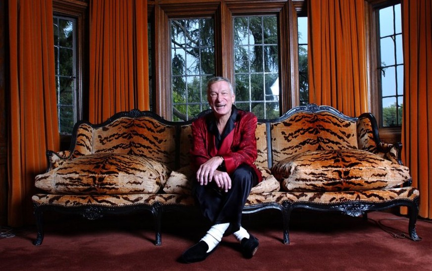 12 Nov 2003, Los Angeles, California, United States --- Hugh Hefner poses for photographs at the Playboy Mansion in Los Angeles. Hugh Hefner and Playboy will celebrate Playboy&#039;s 50th Anniversary  ...
