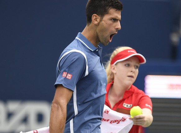 Novak Djokovic of Serbia, celebrates wining the first set against Kei Nishikori, of Japan, during the men&#039;s final of the Rogers Cup tennis tournament, Sunday, July 31, 2016, in Toronto. (Frank Gu ...