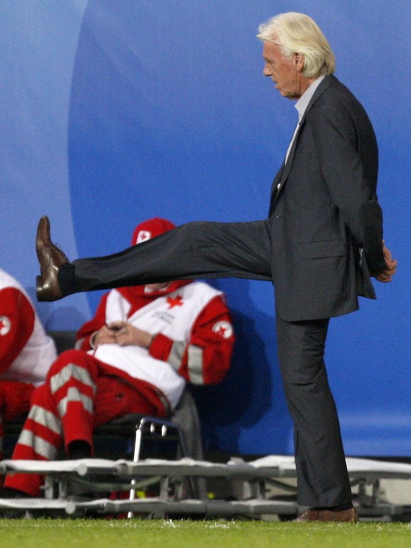 Poland&#039;s Dutch head coach Leo Beenhakker kicks the ball during the group B match between Poland and Croatia in Klagenfurt, Austria, Monday, June 16, 2008, at the Euro 2008 European Soccer Champio ...