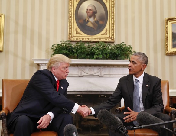 President Barack Obama and President-elect Donald Trump shake hands following their meeting in the Oval Office of the White House in Washington, Thursday, Nov. 10, 2016. (AP Photo/Pablo Martinez Monsi ...