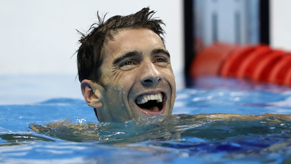 United States&#039; Michael Phelps reacts after the men&#039;s 100-meter butterfly final during the swimming competitions at the 2016 Summer Olympics, Friday, Aug. 12, 2016, in Rio de Janeiro, Brazil. ...